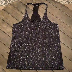 Lululemon tank top. Mesh back. Drawstring hem.